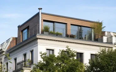 Dachanhebung und Aufstockung eines Hauses